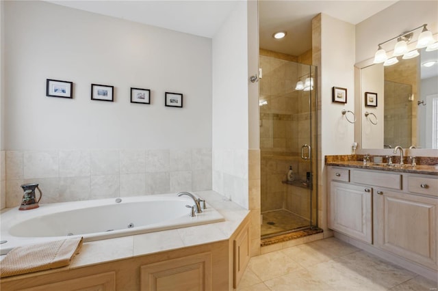 bathroom with vanity, tile patterned flooring, and separate shower and tub