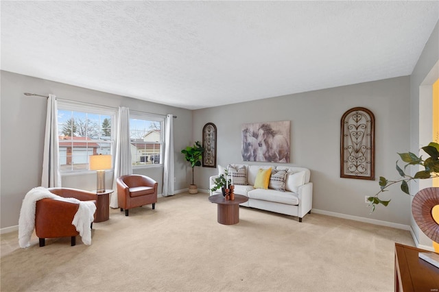 carpeted living room featuring a textured ceiling