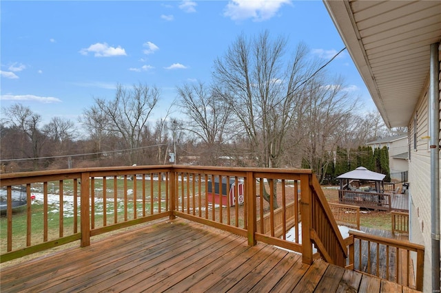 wooden deck featuring a gazebo