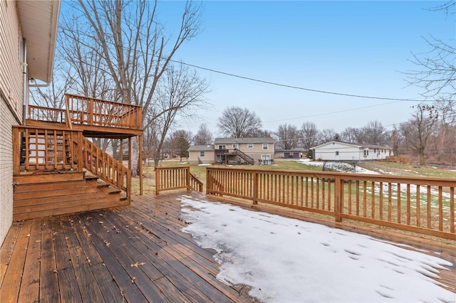 view of snow covered deck