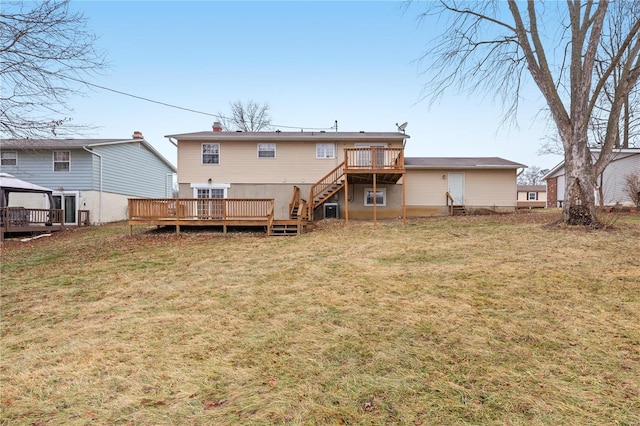 rear view of property with a wooden deck, central air condition unit, and a lawn