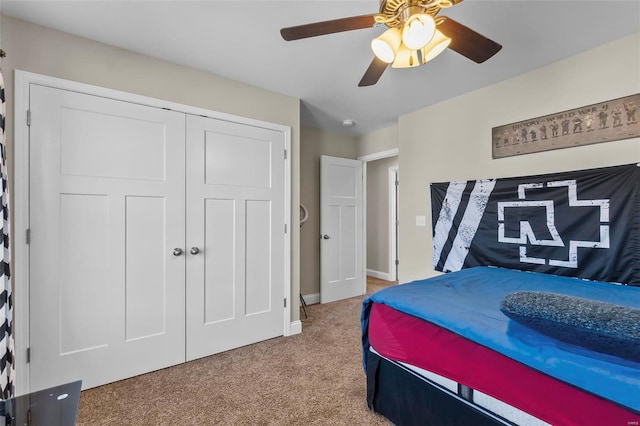 carpeted bedroom featuring ceiling fan