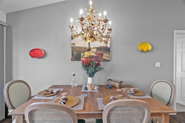 dining room with a notable chandelier