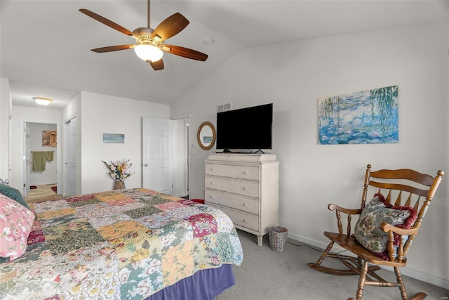 bedroom with lofted ceiling, light carpet, and ceiling fan