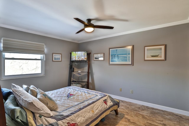 bedroom with ornamental molding and ceiling fan