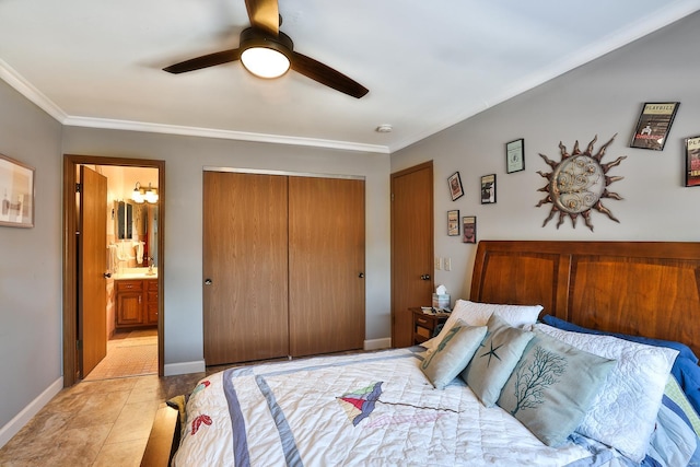 tiled bedroom with ceiling fan, ensuite bath, ornamental molding, and a closet