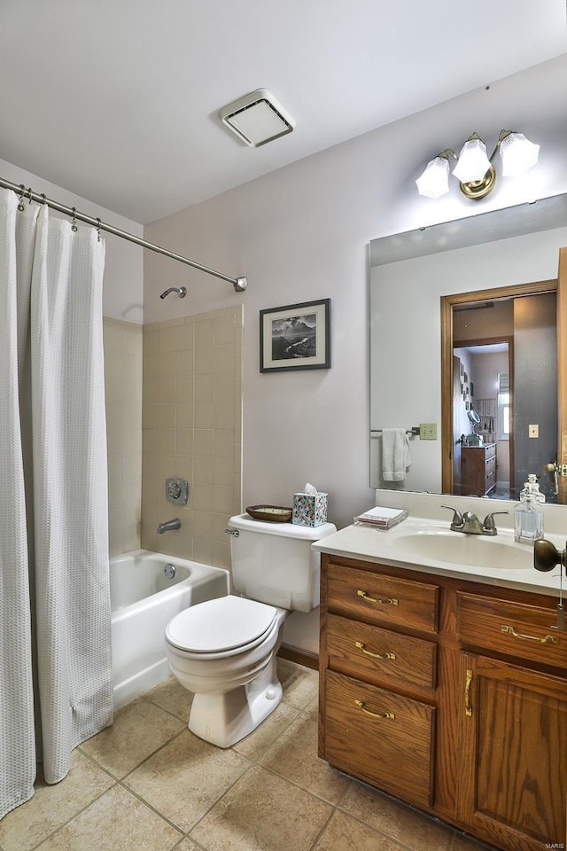 full bathroom featuring vanity, shower / bathtub combination with curtain, tile patterned floors, and toilet