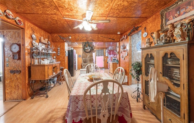 dining room featuring ceiling fan and light wood-type flooring