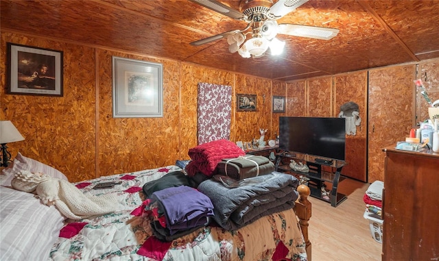 bedroom featuring ceiling fan and light hardwood / wood-style floors