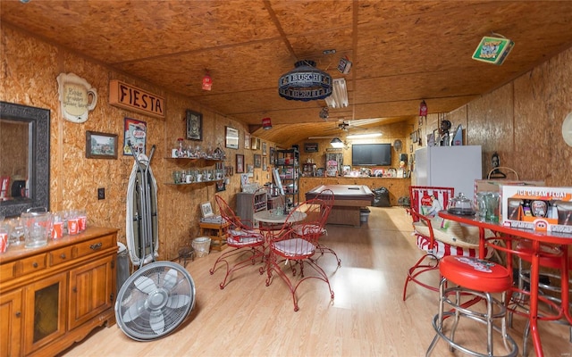 dining room featuring ceiling fan and light wood-type flooring