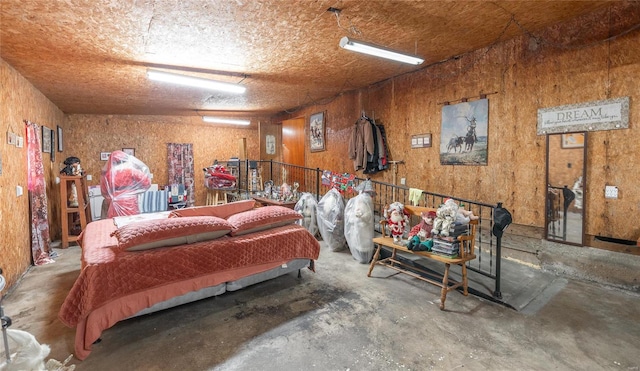 bedroom with concrete floors