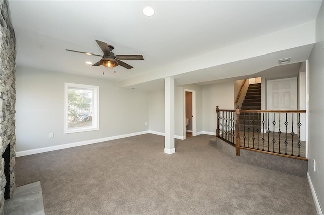 interior space featuring ceiling fan