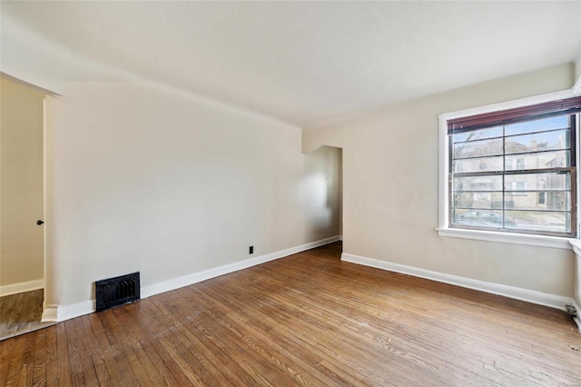 unfurnished room with light hardwood / wood-style floors