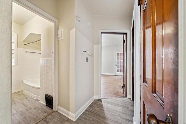 hallway featuring light hardwood / wood-style floors