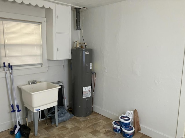 utility room with water heater