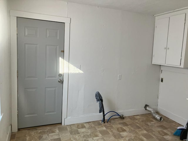 laundry room with cabinets