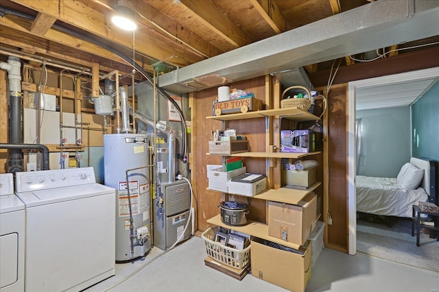 basement featuring separate washer and dryer and gas water heater