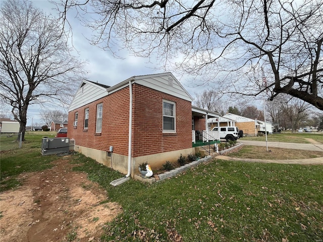 view of home's exterior featuring a lawn