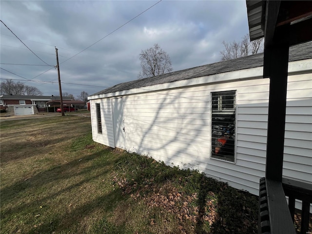 view of home's exterior featuring a lawn