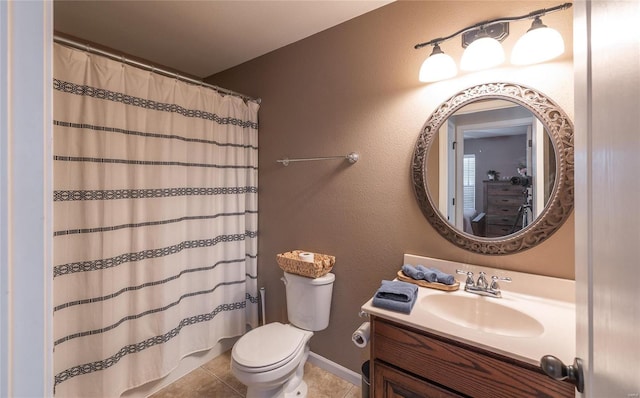 bathroom with tile patterned flooring, vanity, a shower with shower curtain, and toilet