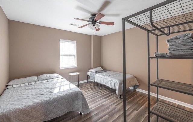 bedroom featuring hardwood / wood-style floors