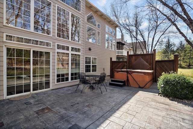 view of patio with a hot tub