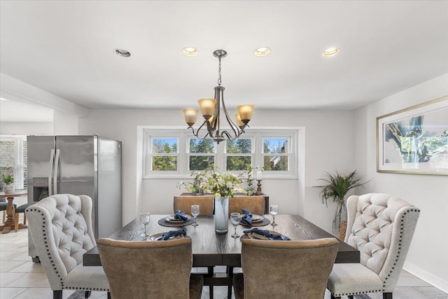 dining room featuring a chandelier, light tile patterned floors, recessed lighting, and baseboards