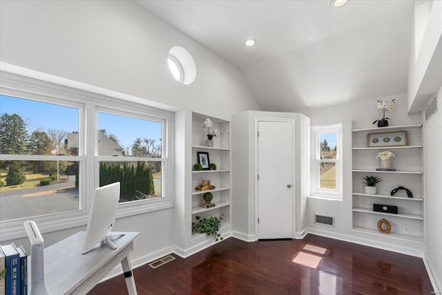 home office featuring lofted ceiling, baseboards, visible vents, and dark wood-type flooring