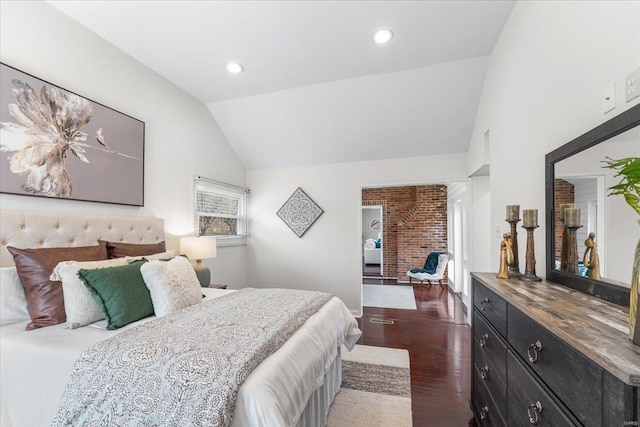 bedroom featuring lofted ceiling, recessed lighting, and dark wood-style floors