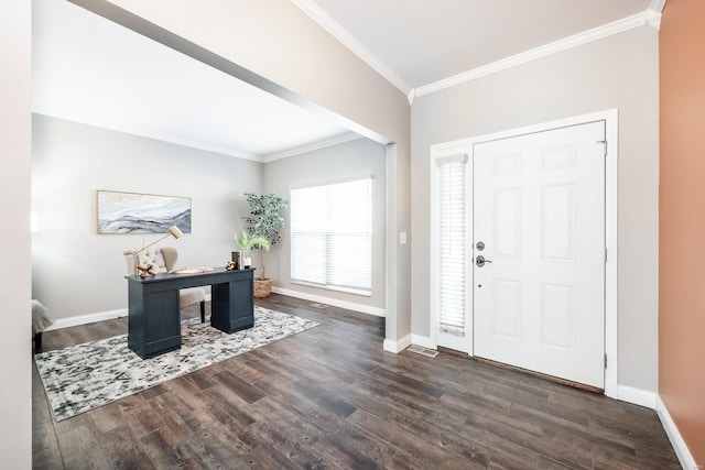 foyer entrance with dark hardwood / wood-style flooring and crown molding