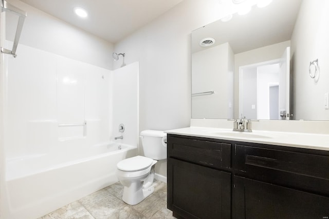 full bathroom with vanity, bathing tub / shower combination, and toilet