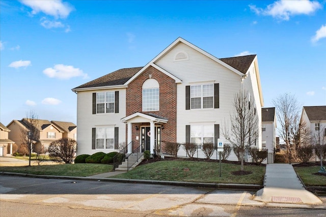 view of front of house featuring a front yard