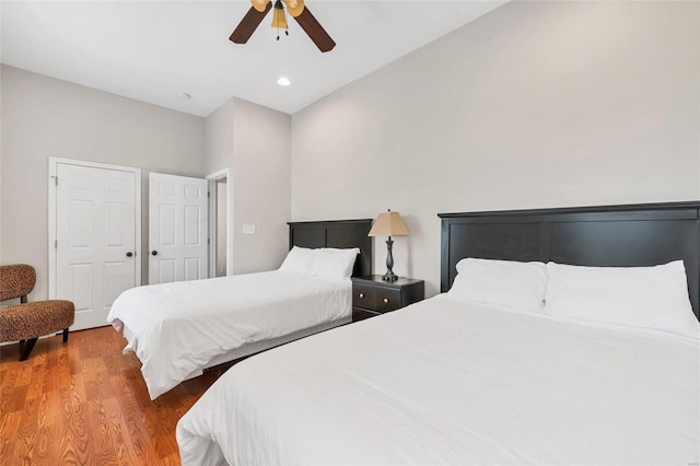 bedroom featuring wood-type flooring and ceiling fan