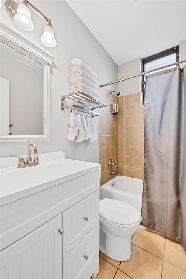 full bathroom featuring shower / bath combination with curtain, vanity, toilet, and tile patterned flooring