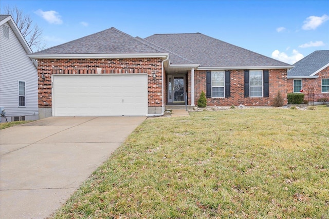 ranch-style house with a garage and a front yard