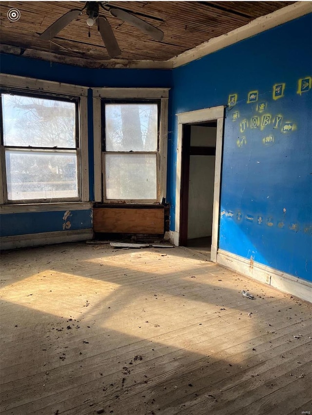 unfurnished room featuring wooden ceiling