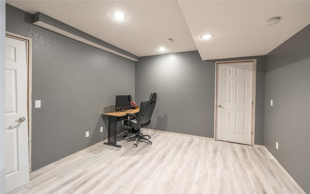 home office featuring light hardwood / wood-style flooring