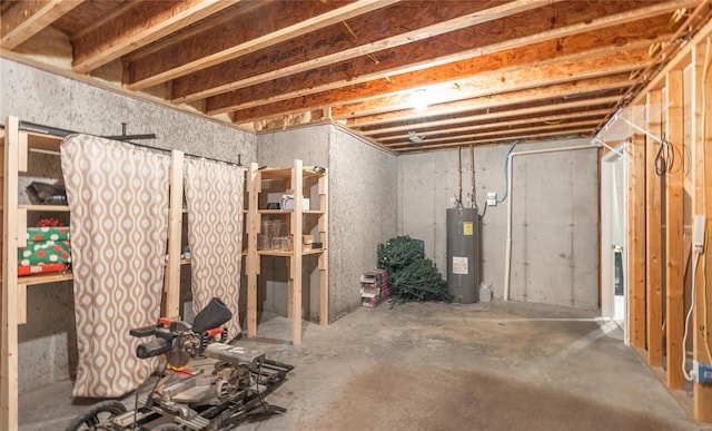 basement featuring electric water heater