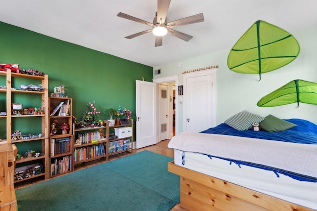 bedroom with wood finished floors