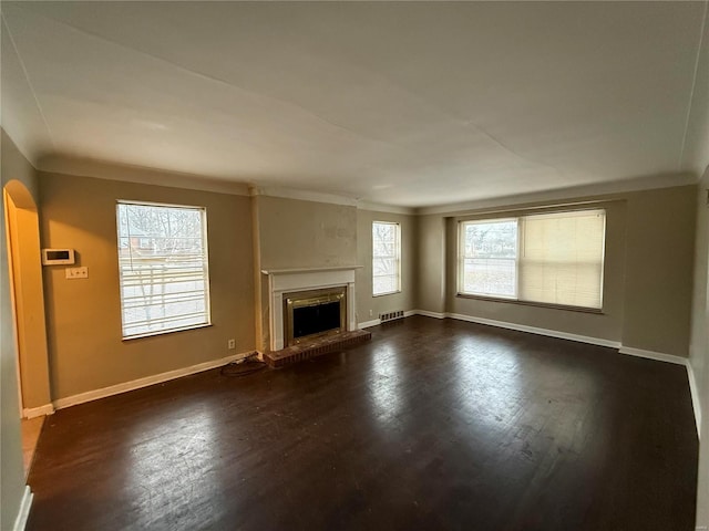 unfurnished living room featuring a fireplace