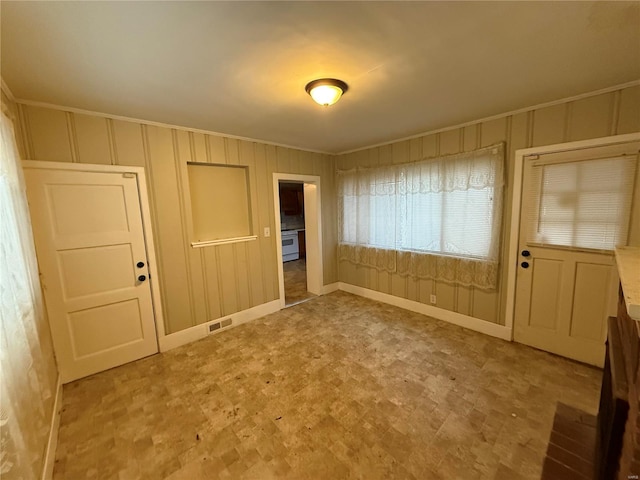 interior space featuring crown molding
