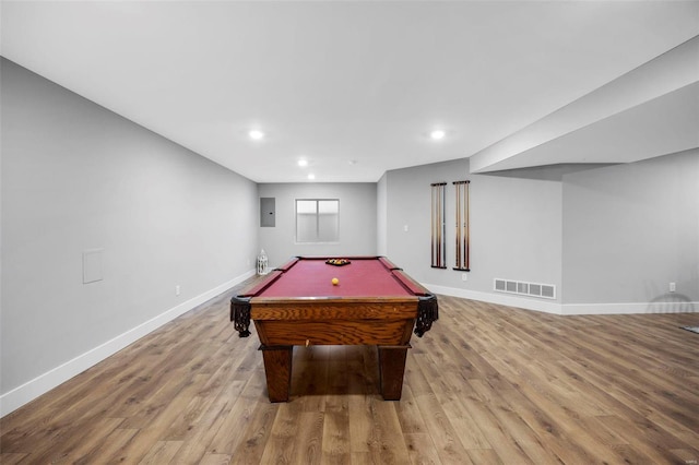 game room featuring wood finished floors, visible vents, and baseboards