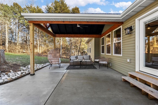 view of patio featuring ceiling fan and an outdoor living space