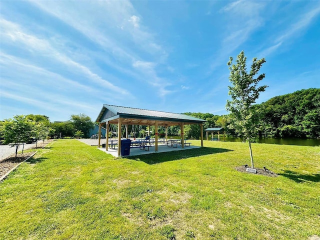 dock area featuring a gazebo and a lawn