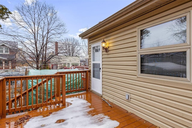 view of snow covered deck