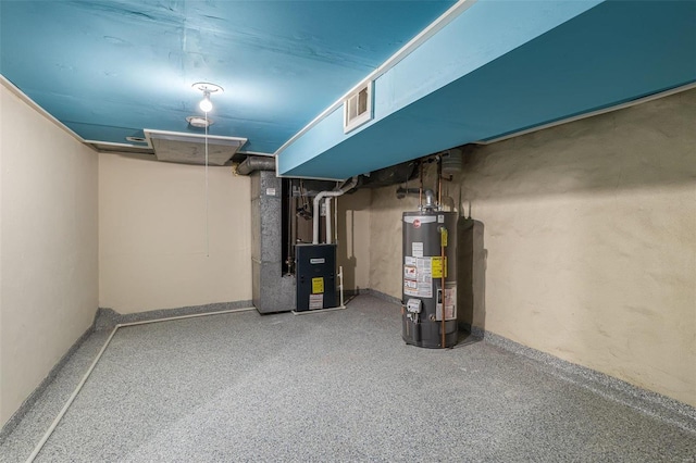 basement with heating unit and gas water heater