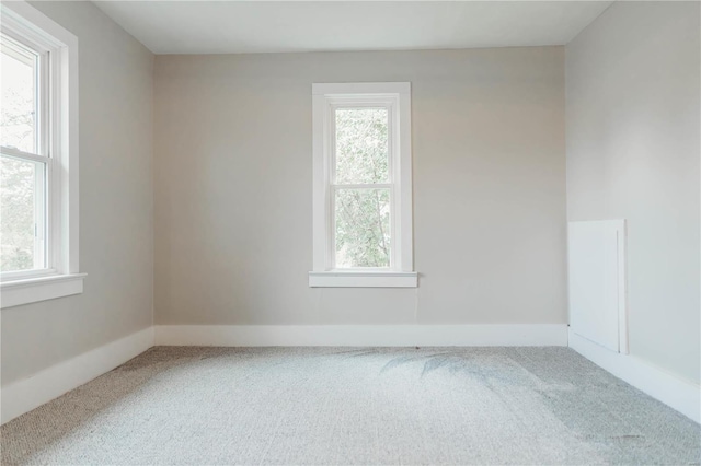 unfurnished room with carpet