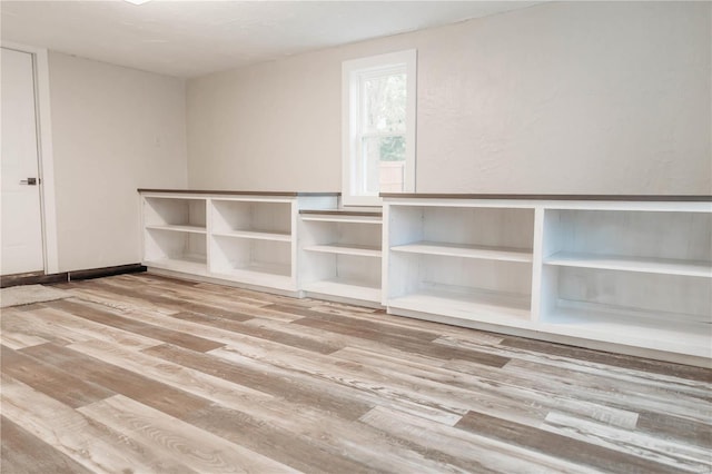 spare room featuring hardwood / wood-style floors