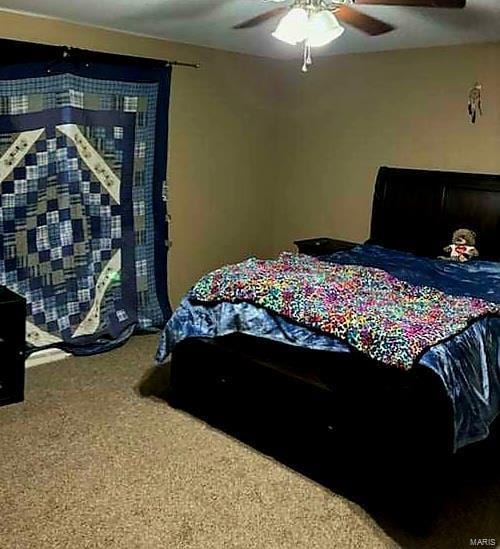 bedroom with carpet floors and ceiling fan