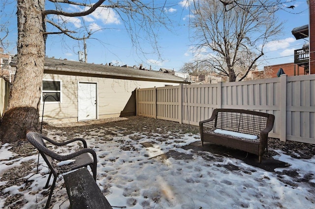 view of snow covered patio